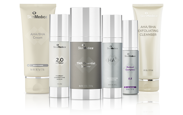A collection of skinmedica skincare products, including creams, serums, and cleansers, arranged elegantly.